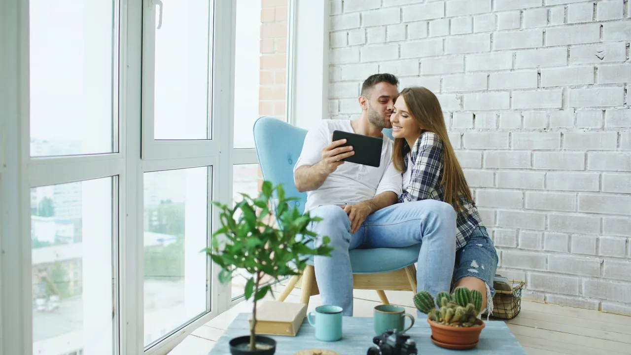 Homebuyers reviewing mortgage affordability and financing information before formal credit review
